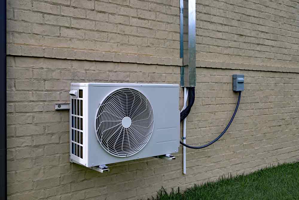 Split System Air Conditioner Mounted On Brick Wall